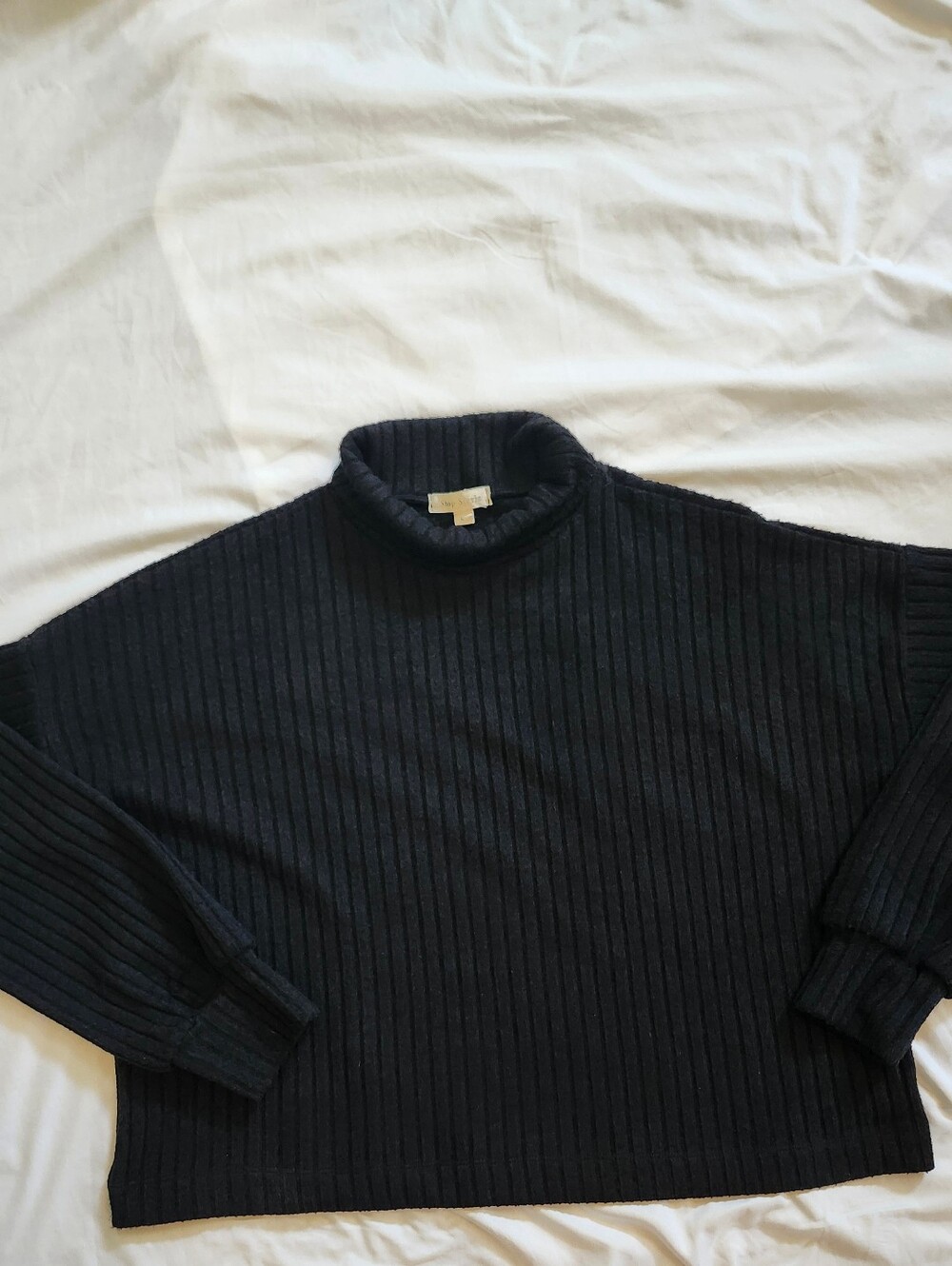 Shop Stevie Black Ribbed Turtleneck Sweater